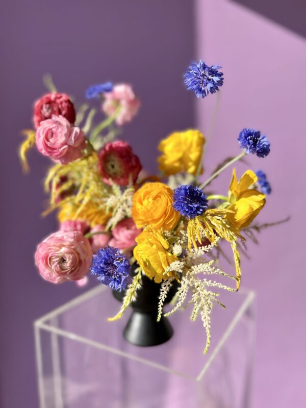 Flower arrangement with pink ranunculus