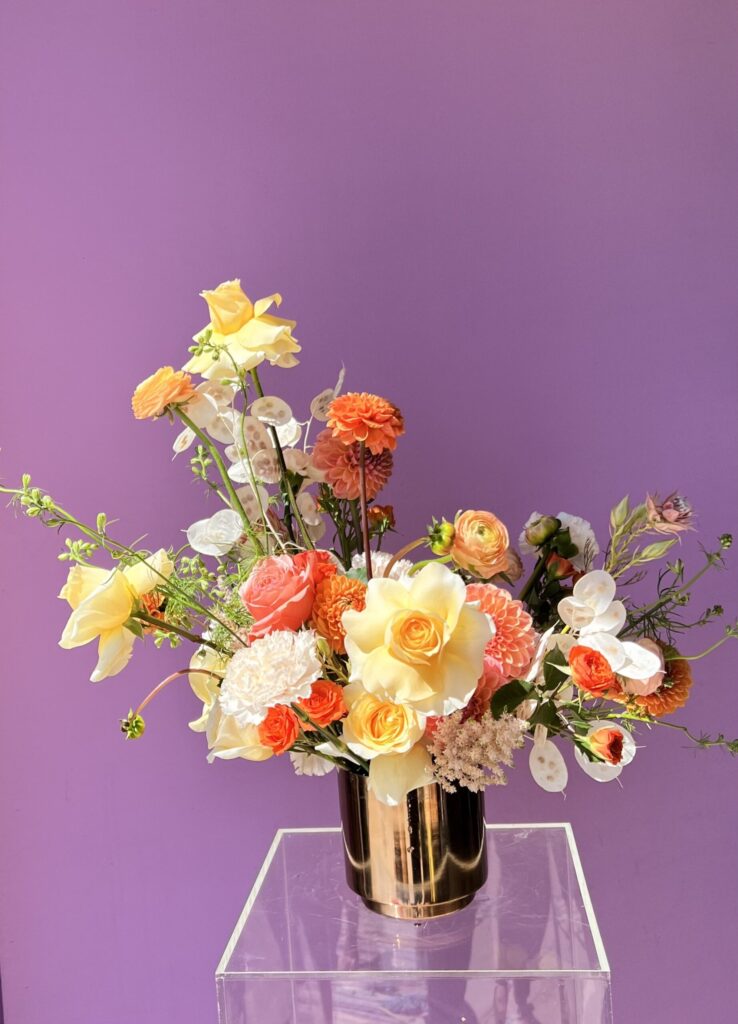 Flower arrangement with yellow roses
