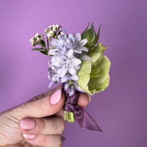 Boutonniere with purple hyacinth