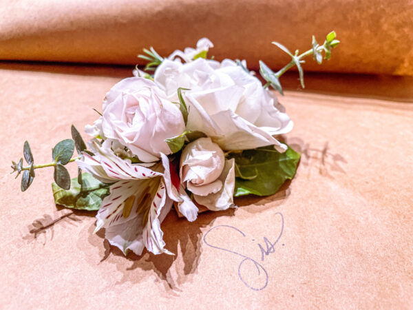 Corsage with white roses